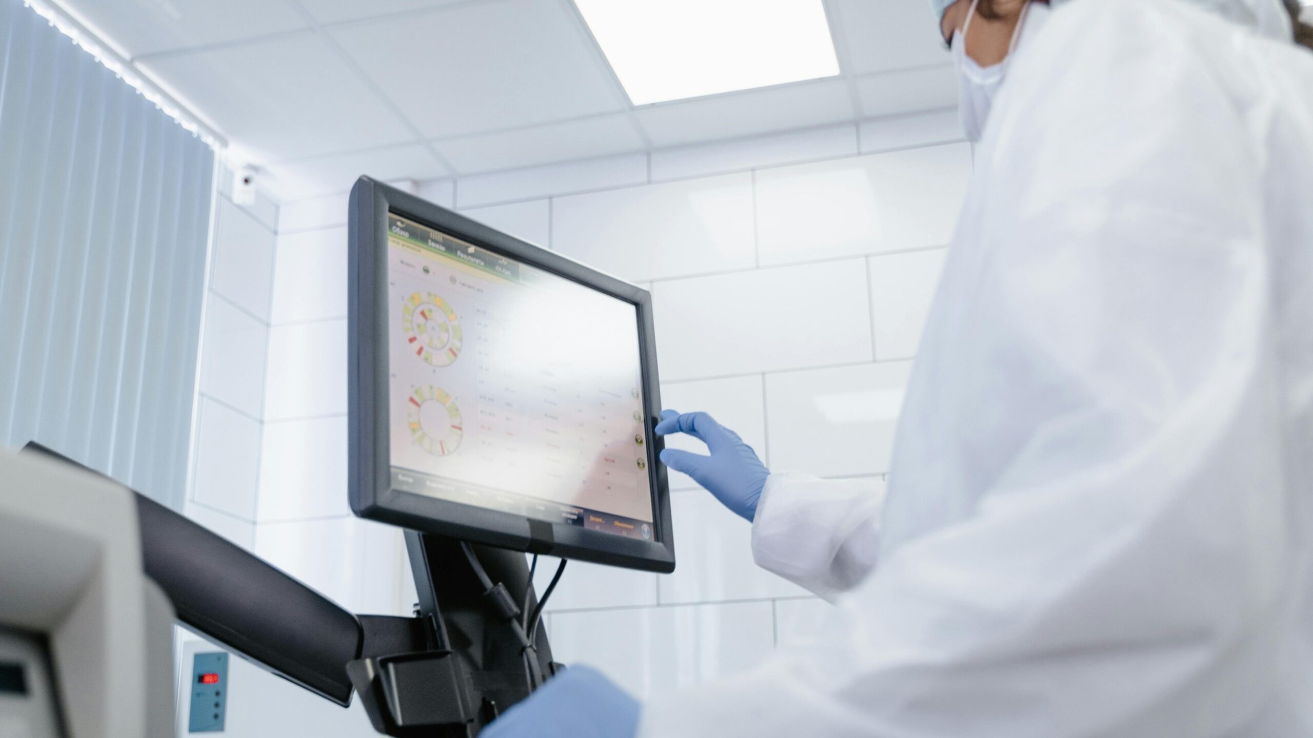 Cath Lab Tech in a cardiac catheterization lab preparing equipment for a procedure