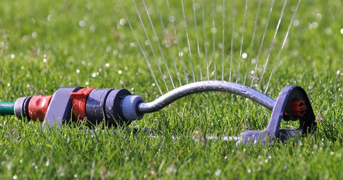 turn on lawn sprinklers